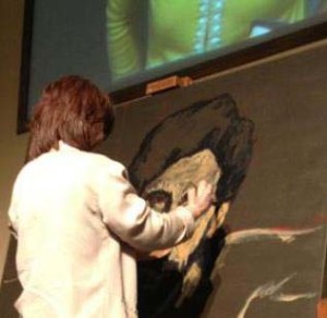 Painting the face of Christ as a form of worship during Easter worship services